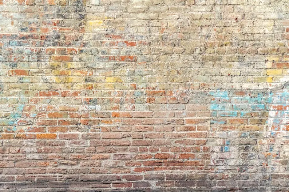 A vibrant weathered brick wall with graffiti art in Pasadena, CA.