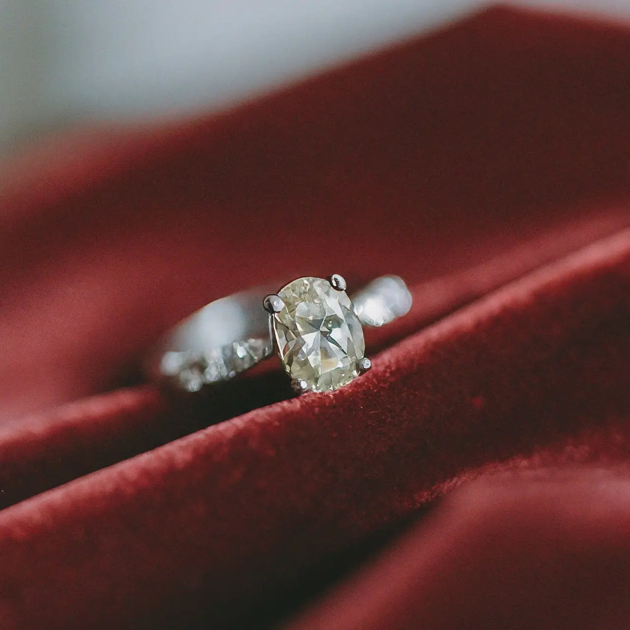 A close-up of a luxury engagement ring on velvet. 35mm stock photo