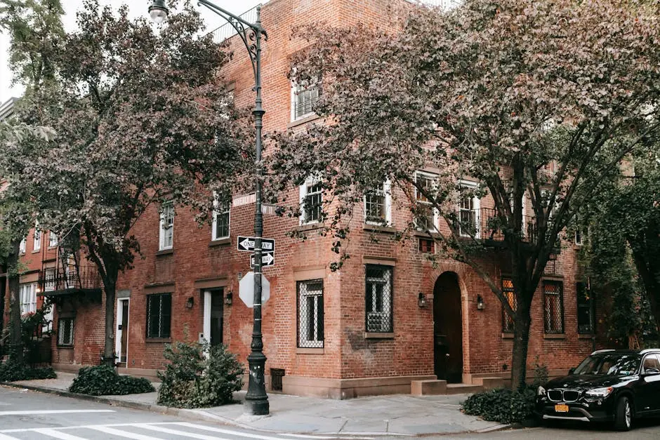 Brown Brick Building Near Green Trees