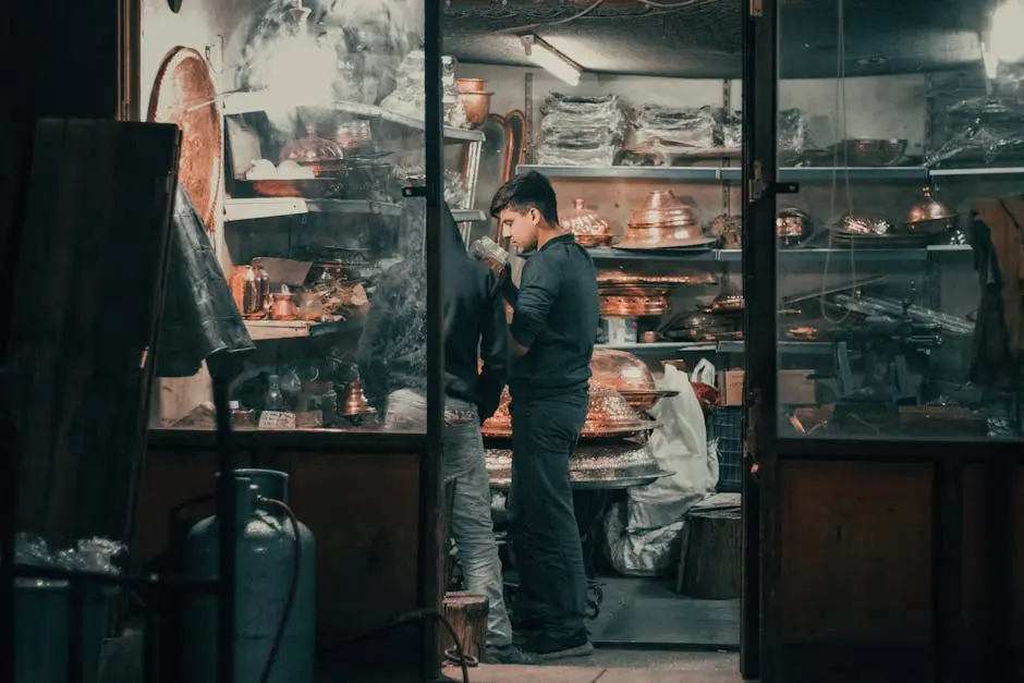 Young ethnic man working in traditional oriental store