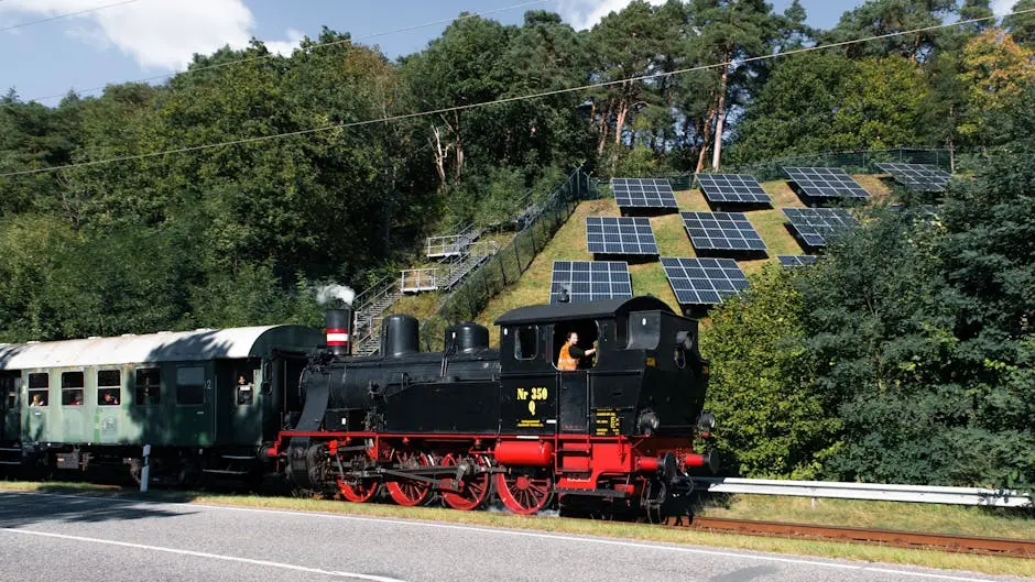 Vintage Steam Train Passing Solar Panels in Nature