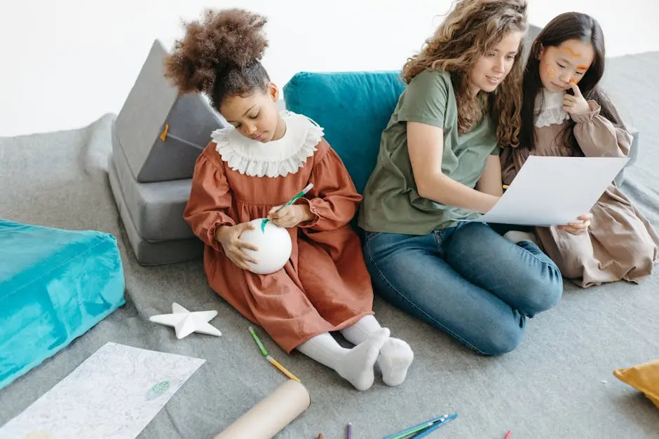 A Teacher Sitting between Her Students