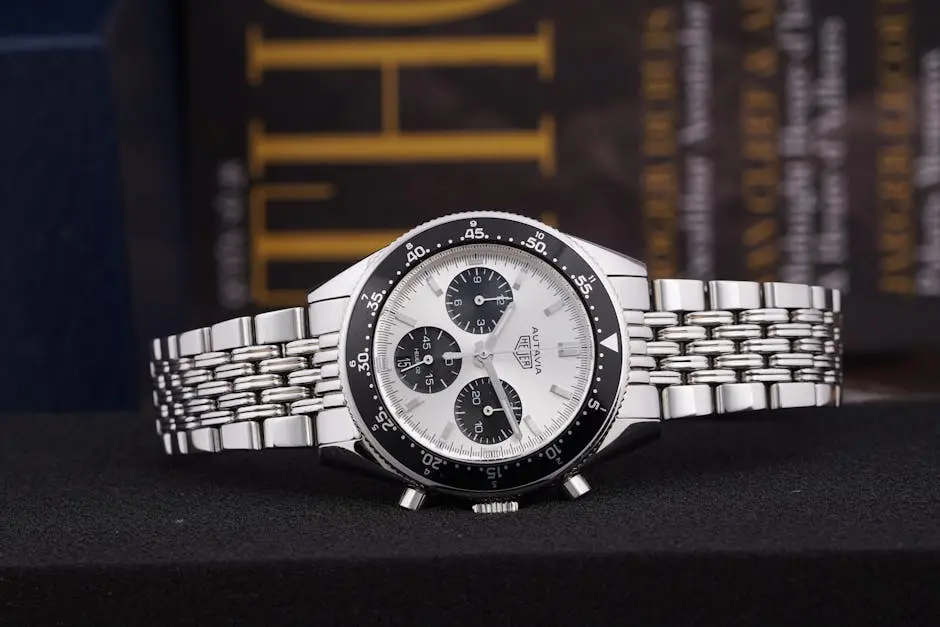 Elegant silver chronograph wristwatch with a detailed clock face and luxury design, perfect for a product showcase.