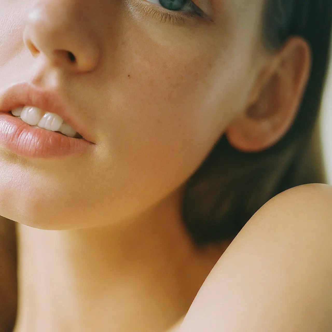 A close-up of smooth, firm skin on a person’s face. 35mm stock photo