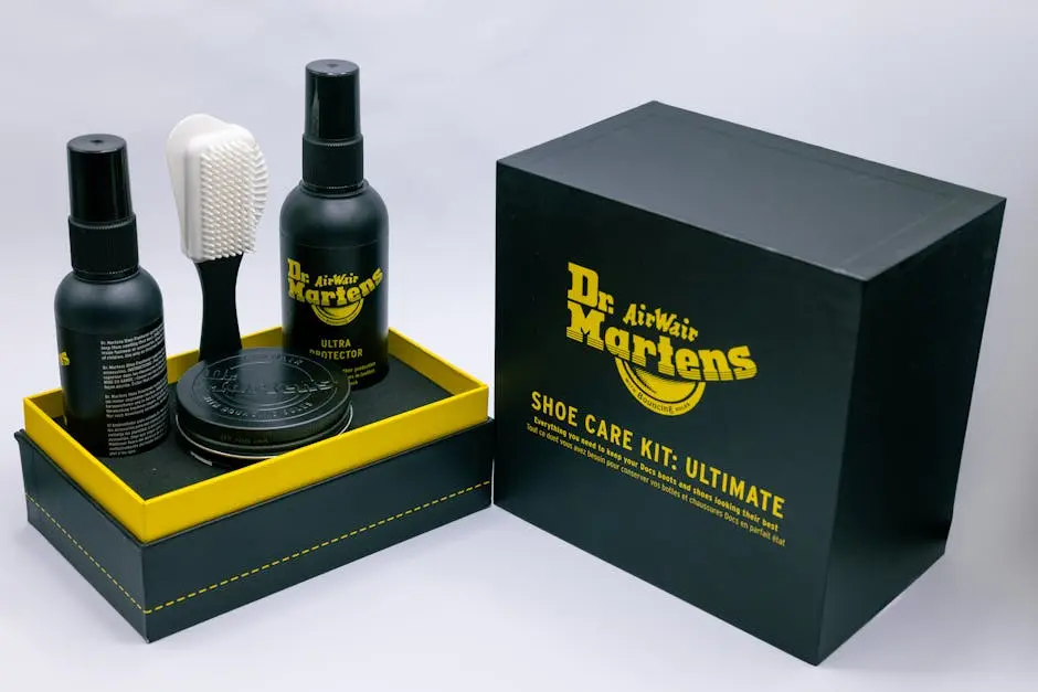 Ultimate Dr. Martens shoe care kit including protector, brush, and wax for leather maintenance.