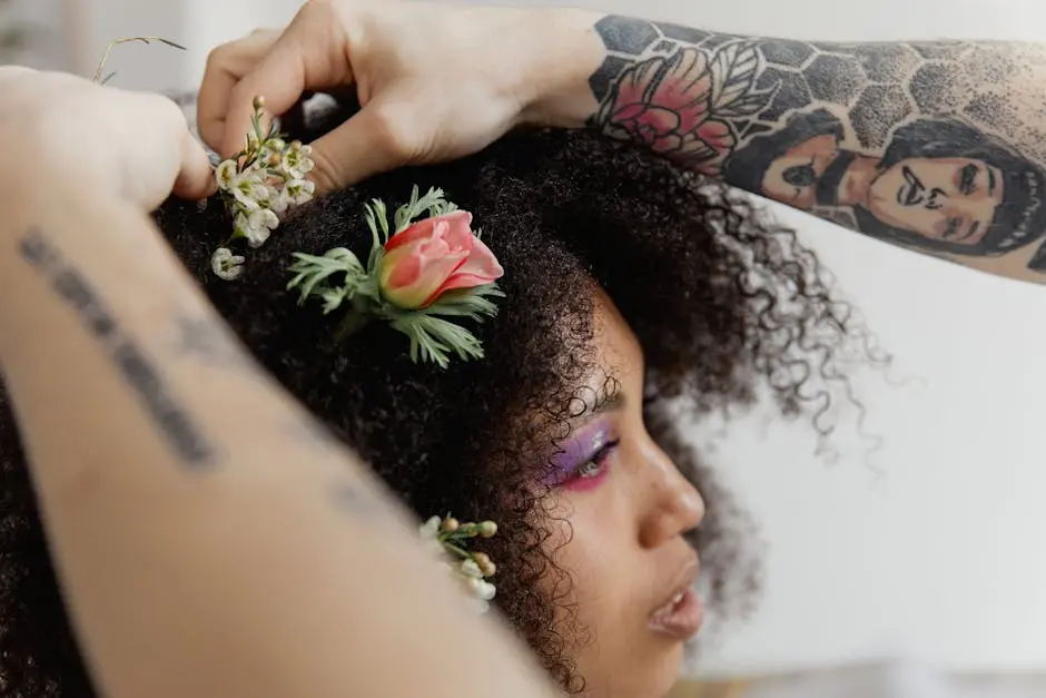 Hair Stylist Fixing a Woman’s Hair and Putting Flowers