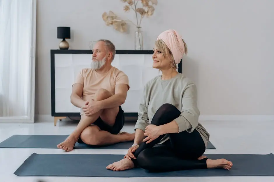 Elderly couple enjoying a relaxing yoga session on mats at home, promoting wellness.