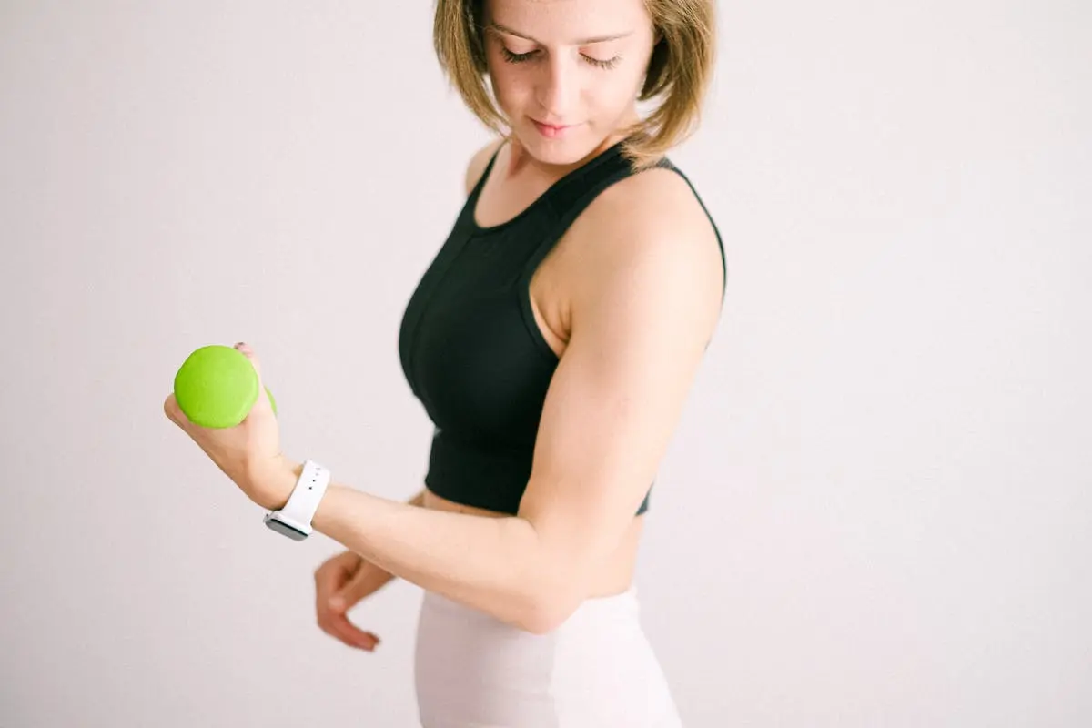 A Woman Holding a Dumbbell