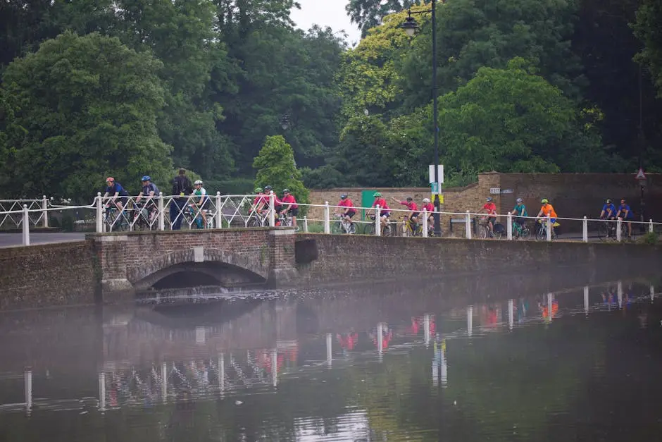 A group of people are crossing a bridge