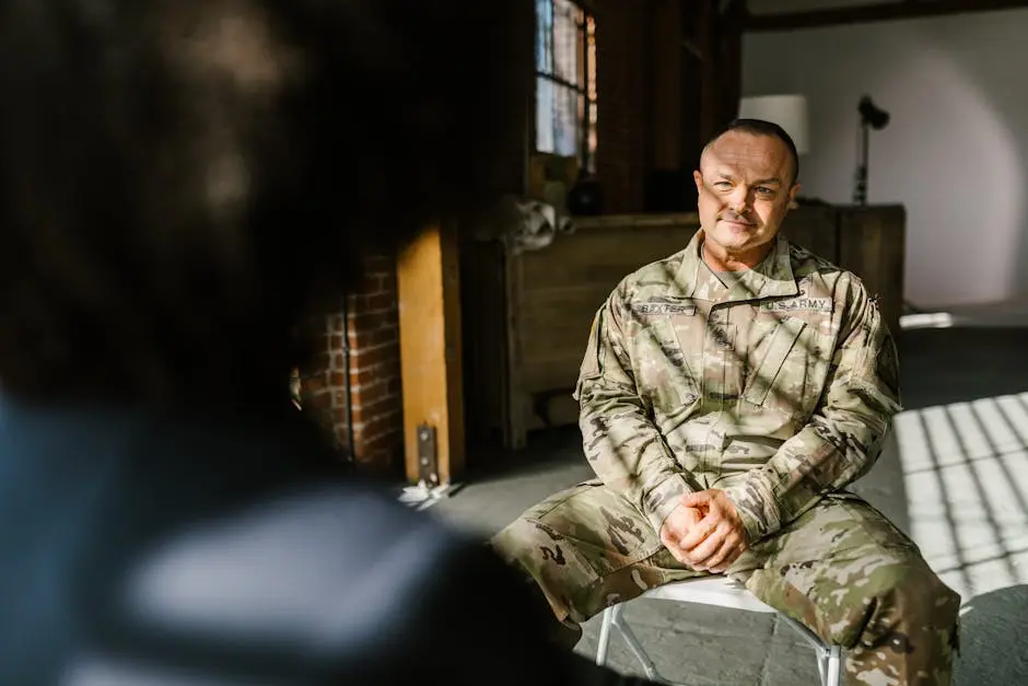 Photo of Soldier Listening to a Psychologist