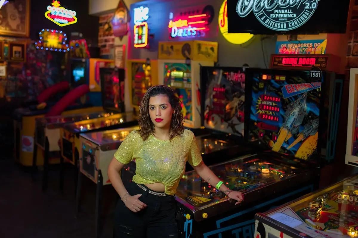 Woman Posing by Machines in Casino