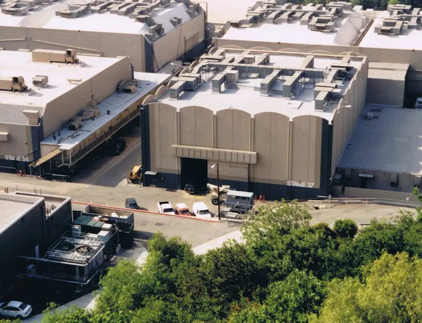 A high angle view of industrial buildings with rooftops in Los Angeles, CA.