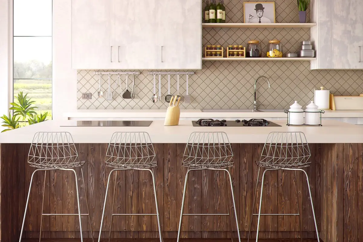 Four Gray Bar Stools in Front of Kitchen Countertop