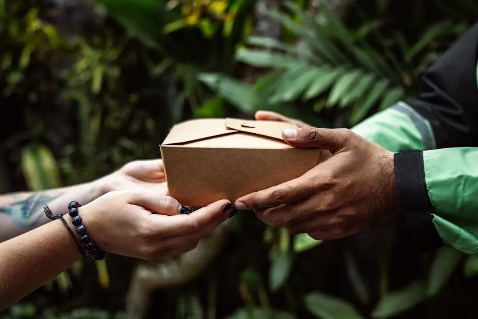 Close up of a Person Handing Over a Package