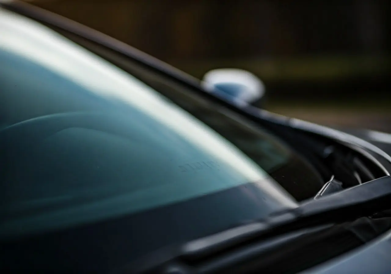 A close-up of a car’s windshield with calibration markings. 35mm stock photo