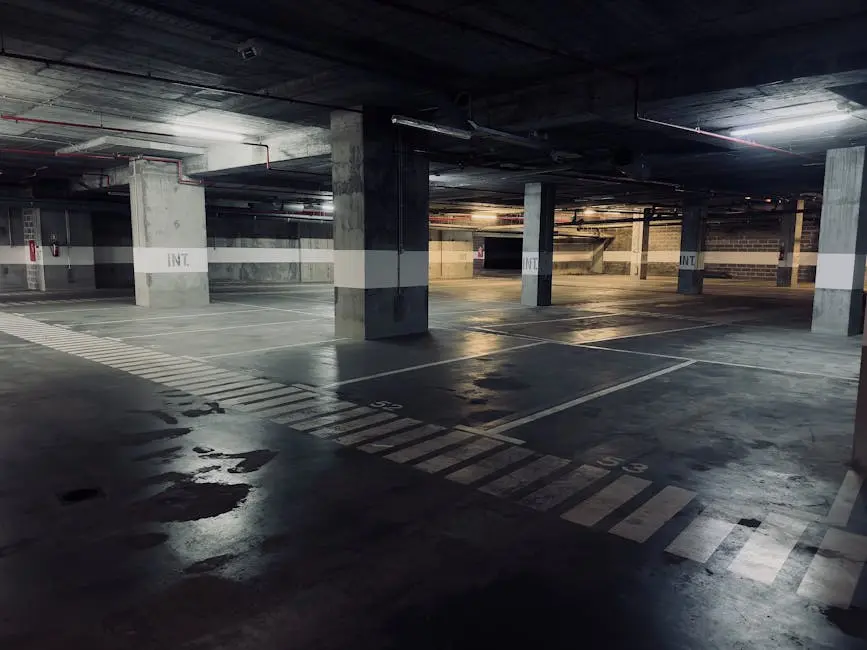 View of an Empty Parking Garage with Wet Floor