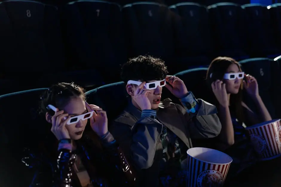 Group of Friends Wearing 3d Glasses while Watching a Movie