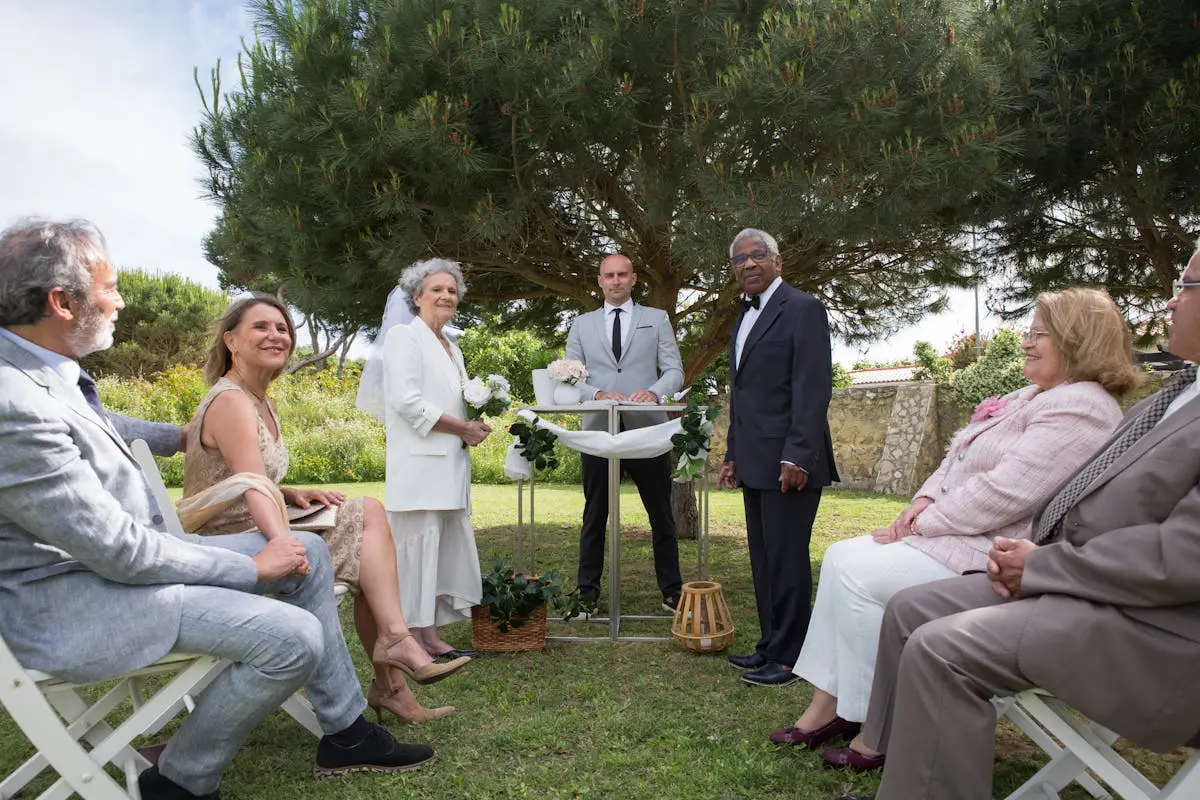 Wedding Couple Standing Beside the Pastor