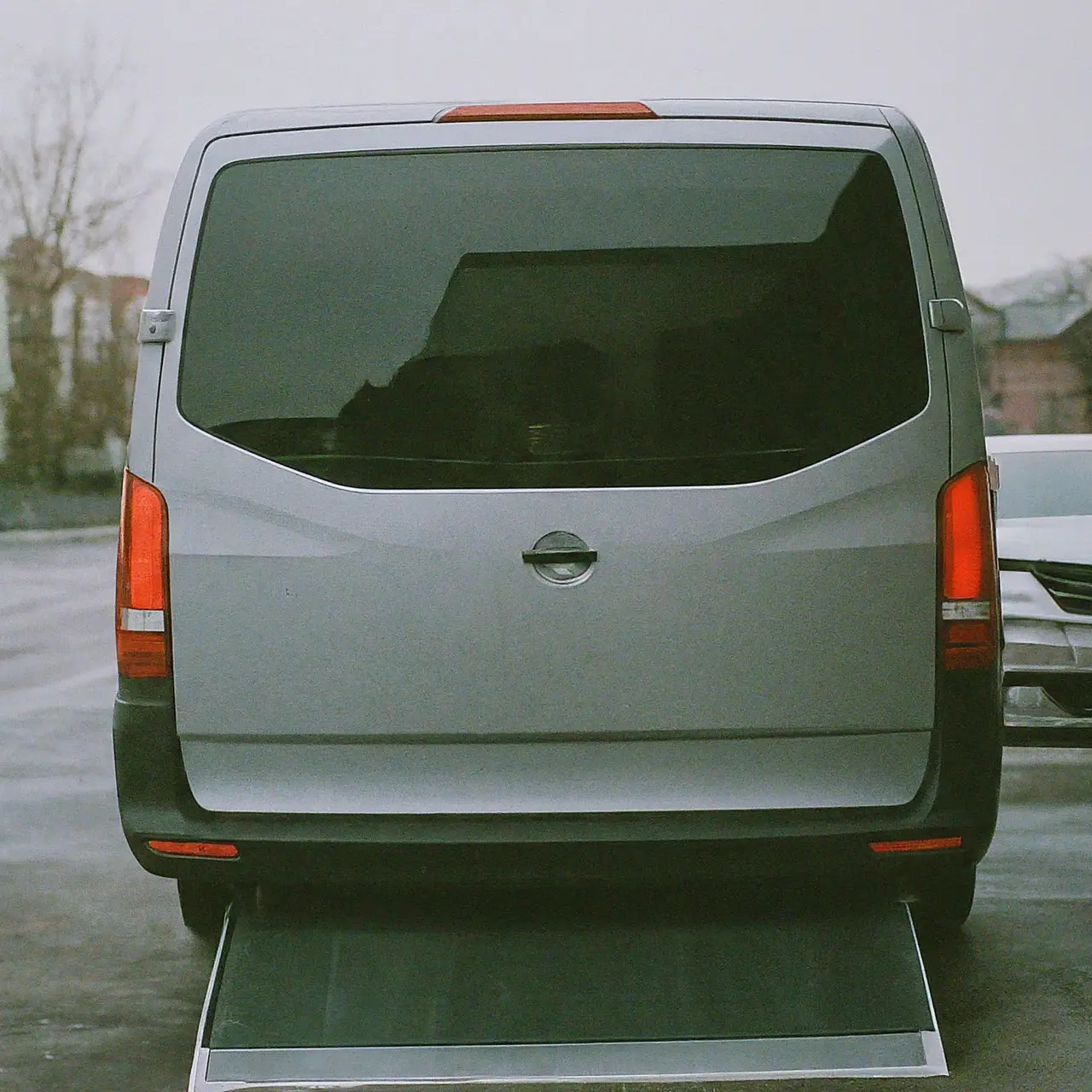 A modern accessible van with a wheelchair ramp. 35mm stock photo