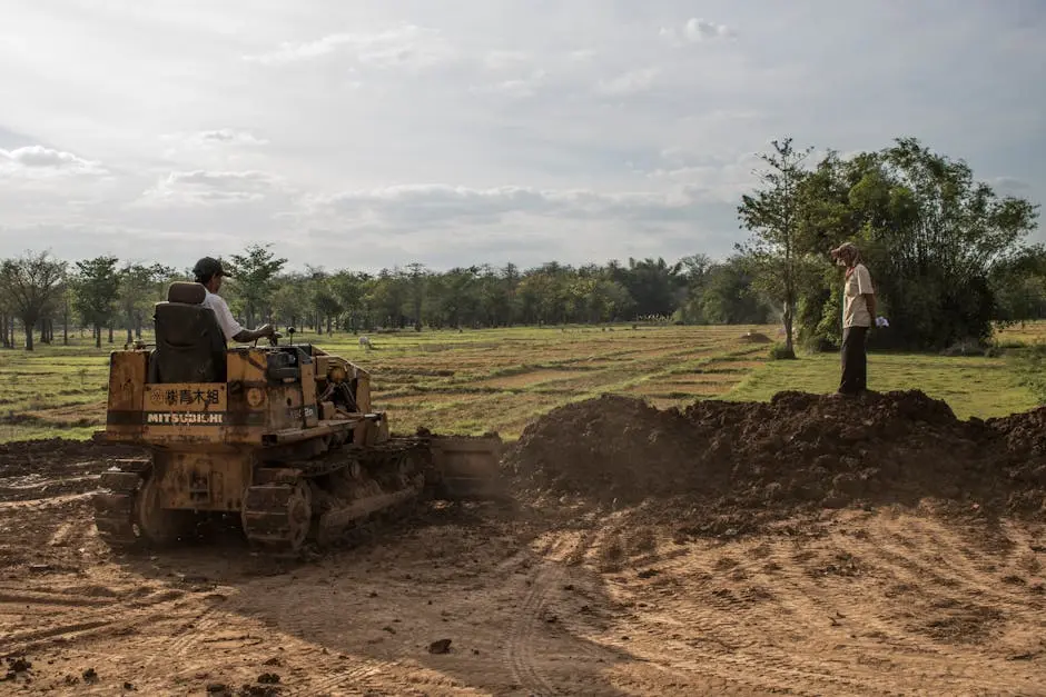 Two Men Working on Earthworks