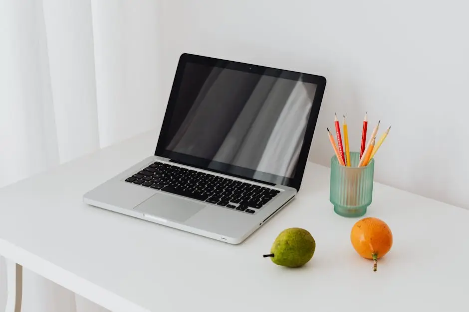 Black and Gray Laptop on the Table