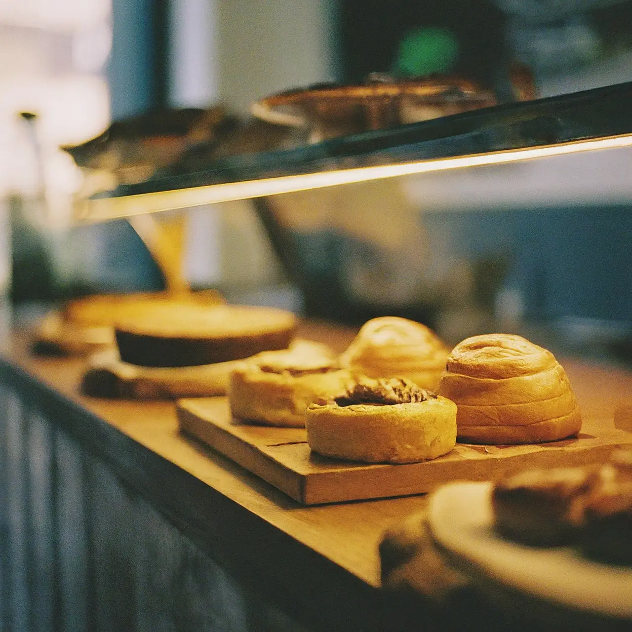 A vibrant café with nut-free pastries displayed. 35mm stock photo