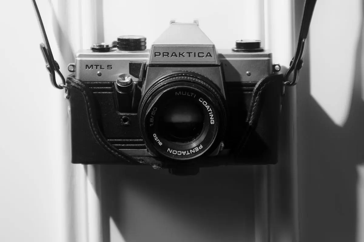 Vintage Camera Praktica Mtl5 Hanging On The Strap Of The Case