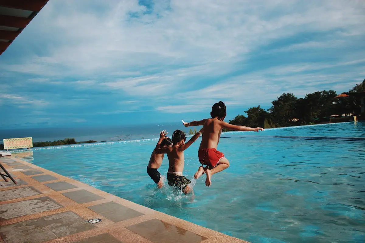 Three Boy’s Jumping Into the Water