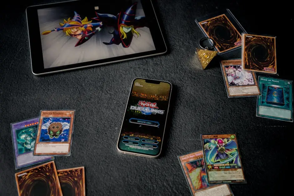 iPhone with the game Yu-Gi-Oh! Duel Links playing on the display & an iPad playing Yu-Gi-Oh! Card Game The Chronicles || Yu-Gi-Oh! Card Game 25th Anniversary || Jovan Vasiljević Photography