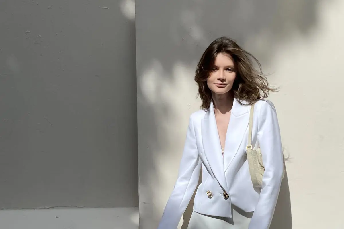 Stylish Woman in White Blazer Outdoors