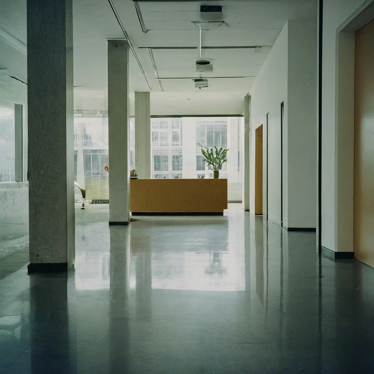 A spotless, modern office reception area with gleaming floors. 35mm stock photo