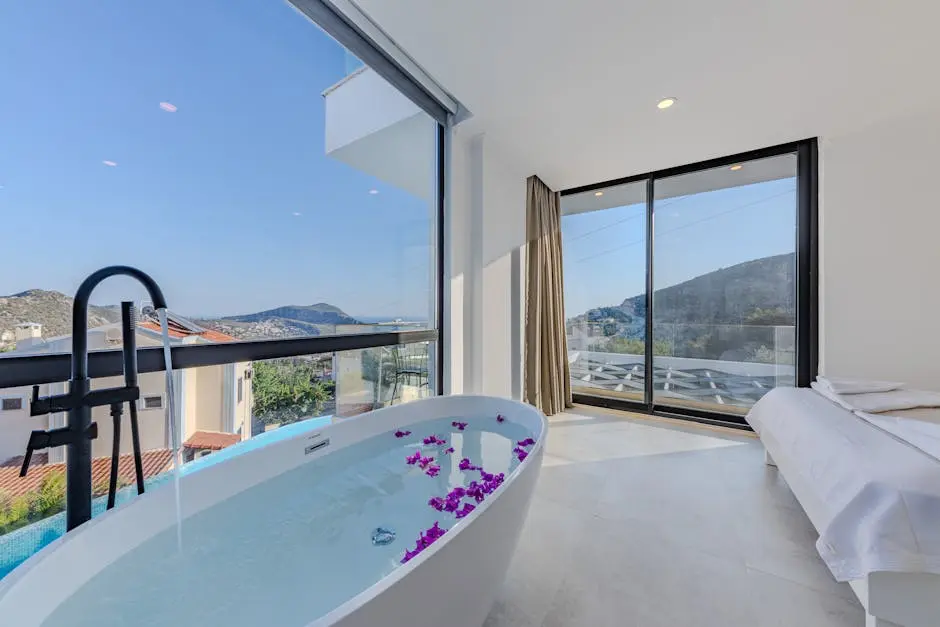 A large bath tub in a bedroom with a view