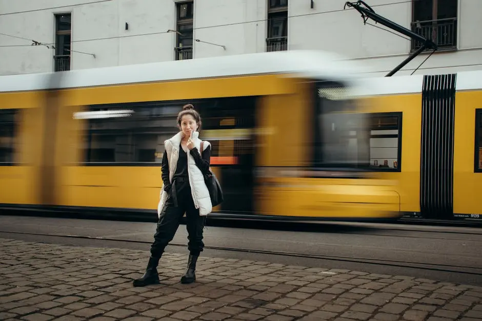 Woman Posing with Motion Blurred Berlin Tram