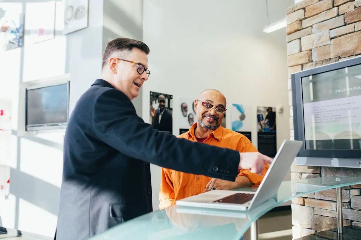 Man Pointing Laptop Computer