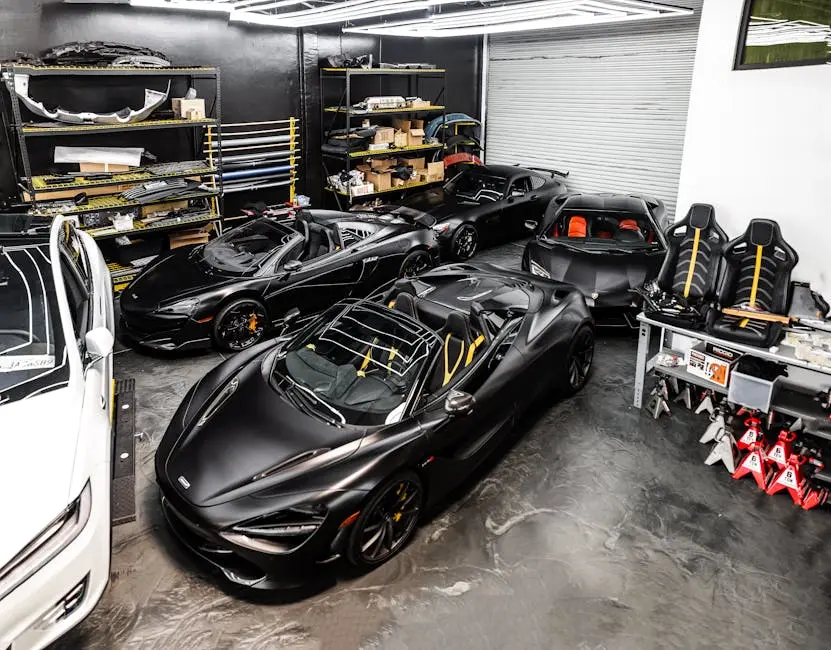 Three high-end sports cars in a well-organized modern garage showcasing automotive elegance.