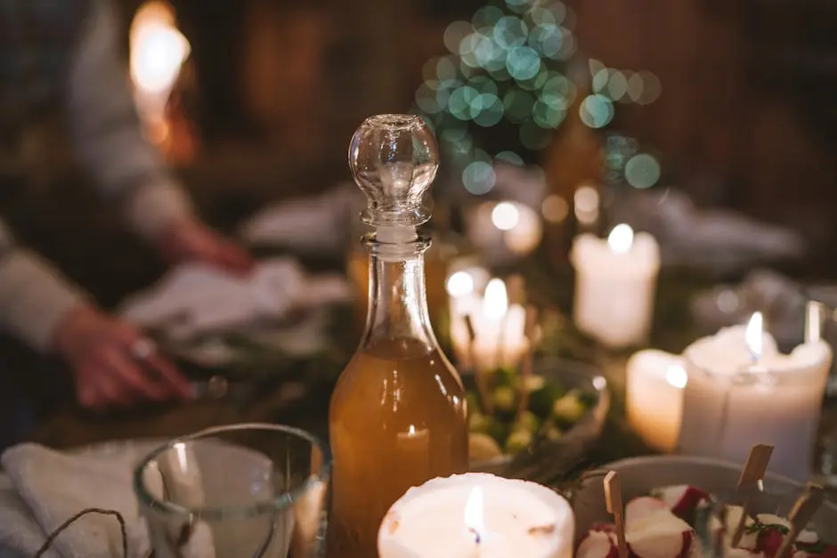 Selective Focus Photography of Clear Glass Bottle With White Candle